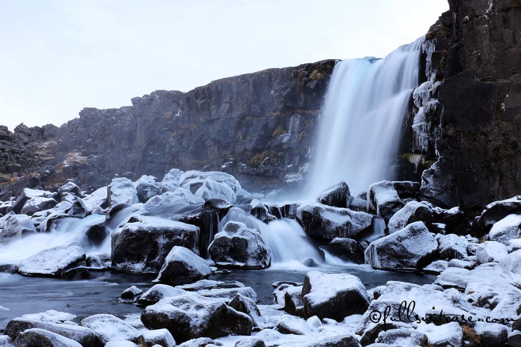 Winter waterfall in Thingvellir Iceland