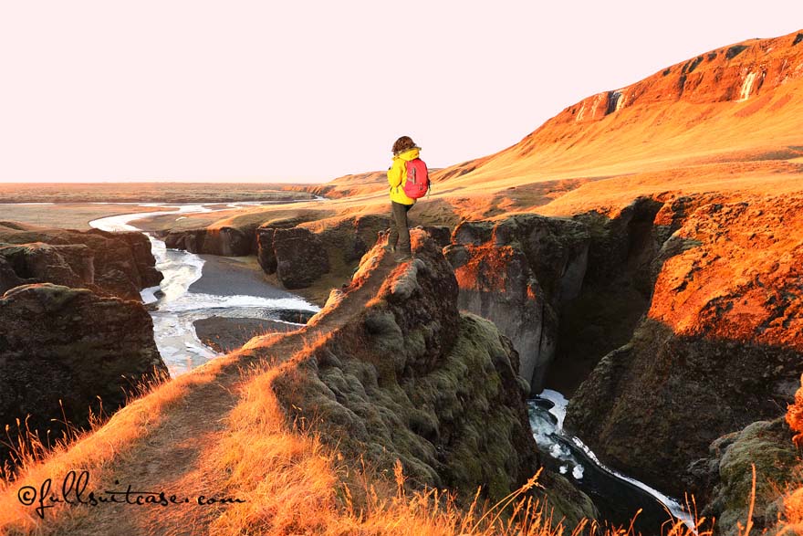 Hiker in Fjadrargljufur canyon Iceland