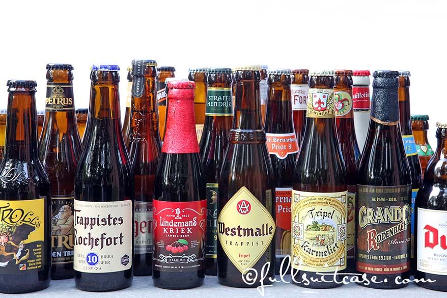 Variety of Belgian beer bottles like Kriek, Westmalle, Trappistes Rochefort and many more