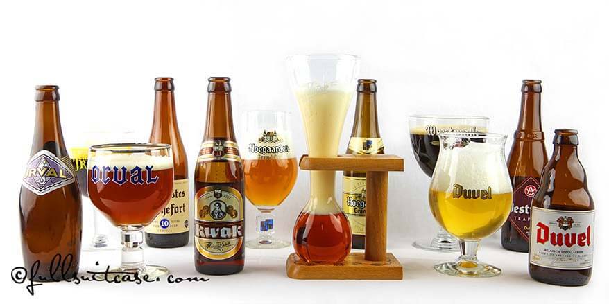 Variety of Belgian beers with matching glasses