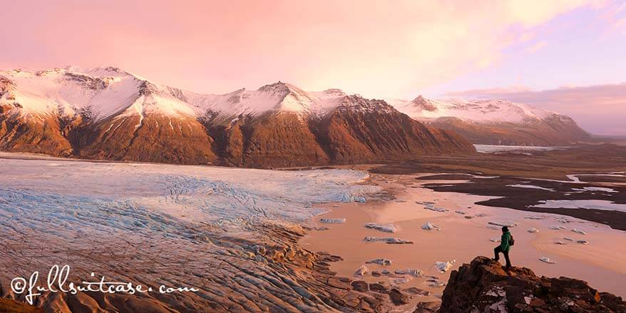 Hiker at Skaftafell glacier view point at sunset