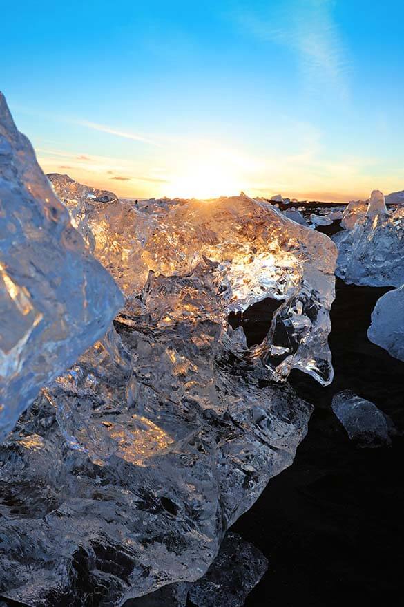 Jokulsarlon Diamond beach in Iceland magically lit in winter