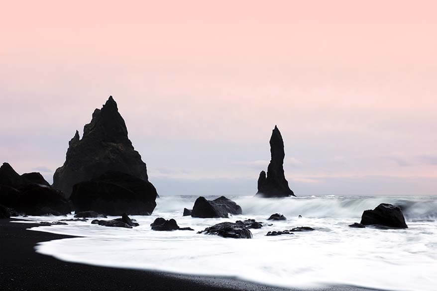 Vik black sand beach in Iceland at sunset in winter