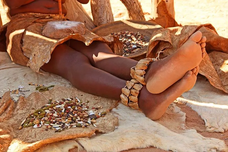 Damara woman making traditional jewellery - Namibia