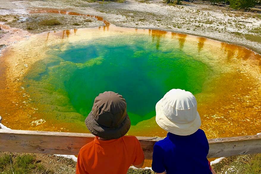 Kids at the Morning Glory Pool in Yellowstone