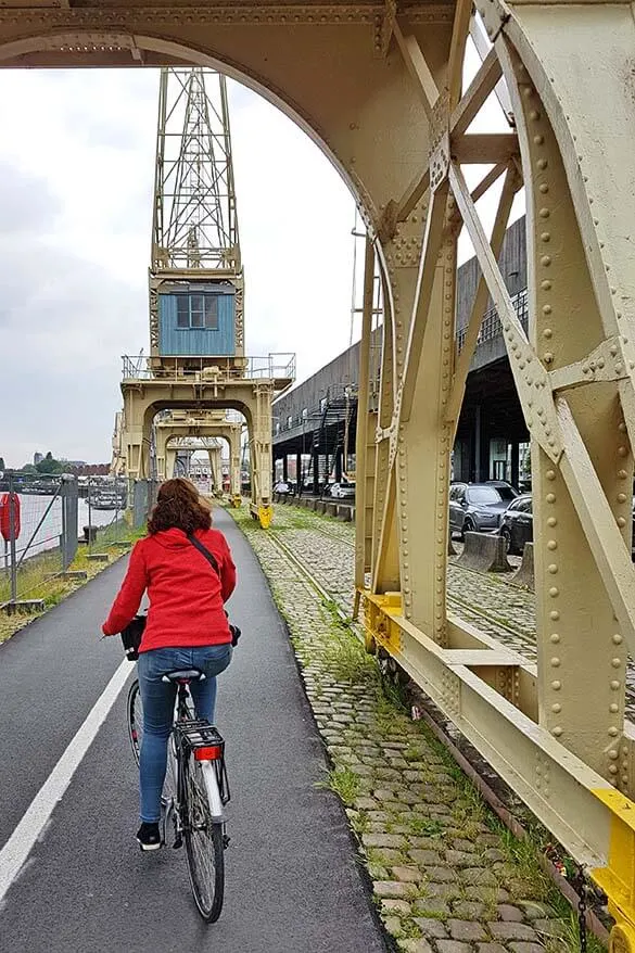 Exploring Scheldt river quays in Antwerp by bike