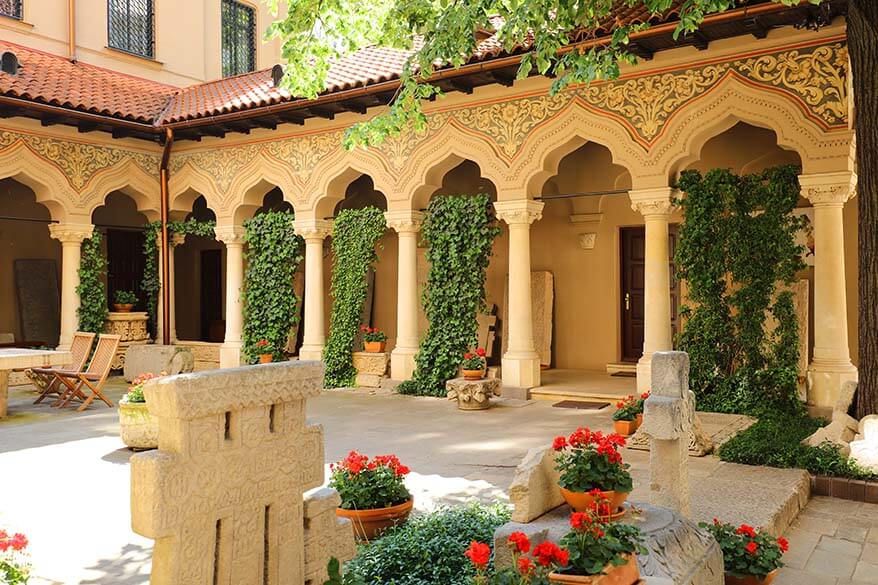 The little garden of 18th century Orthodox Stavropoleos Monastery in Bucharest Romania