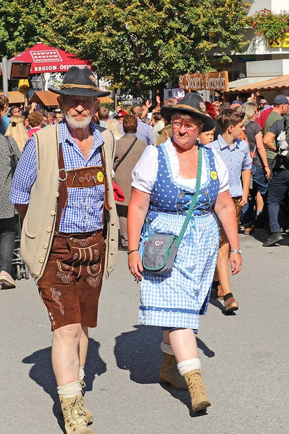 Local people in traditional Tyrollean outfits - dirndl and lederhosen