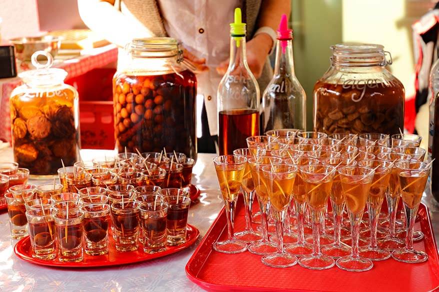 Traditional Austrian schnaps for sale at a farmers market in Tirol