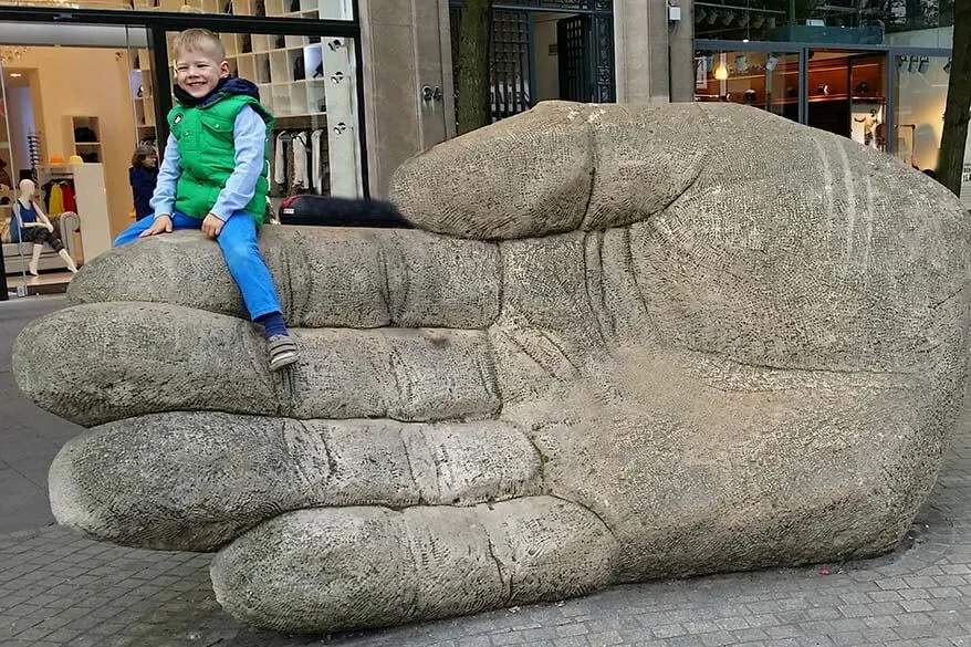 The giant hand statue is a must see in Antwerp with kids