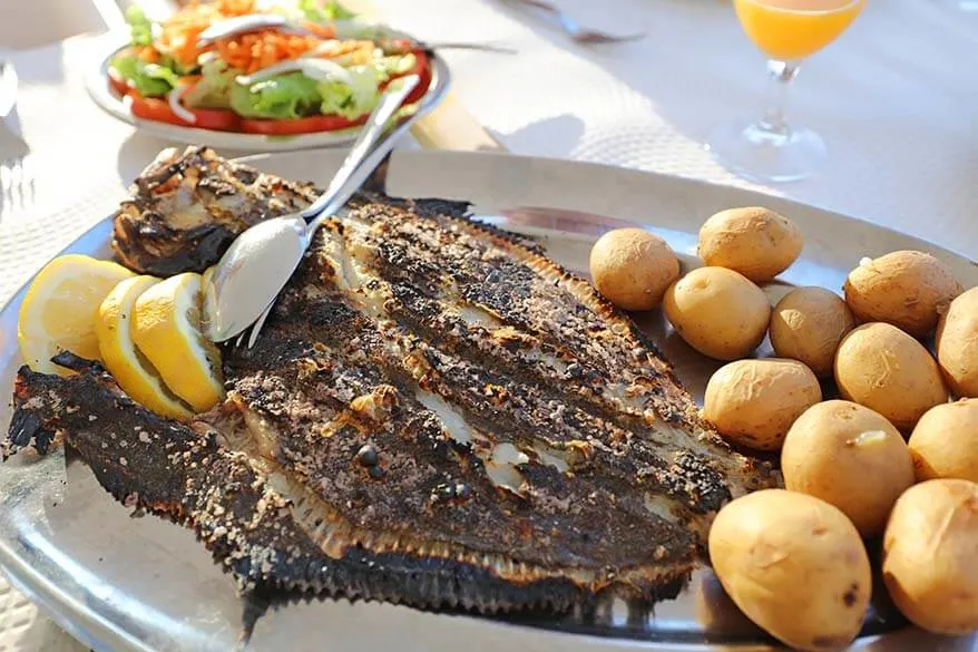 Dinner with catch of the day in a local restaurant in Nazare Portugal