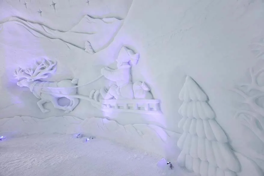 Sami on the reindeer sled ice carving - this image is probably the predecessor of Santa Claus