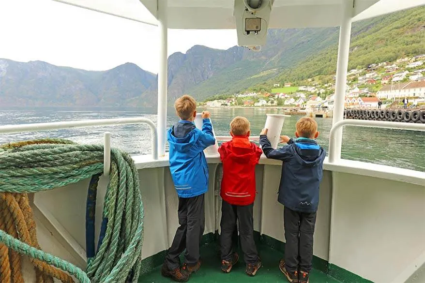 Kids on a fjord safari in Norway in summer