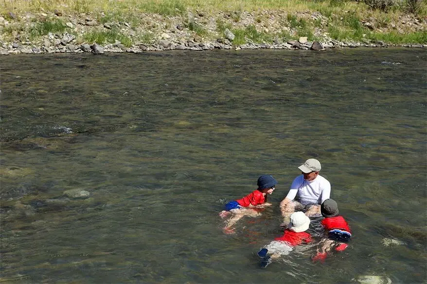 Bathing in the Boiling River in Yellowstone with kids