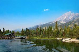 Best way to spend one day in Grand Teton National Park is to take a Jenny Lake boat and hike to Hidden Falls and Inspiration Point