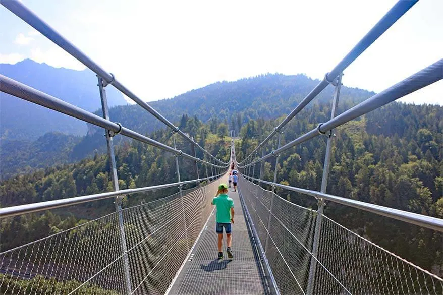 Kids walking on Highline 179 suspension bridge in Austria