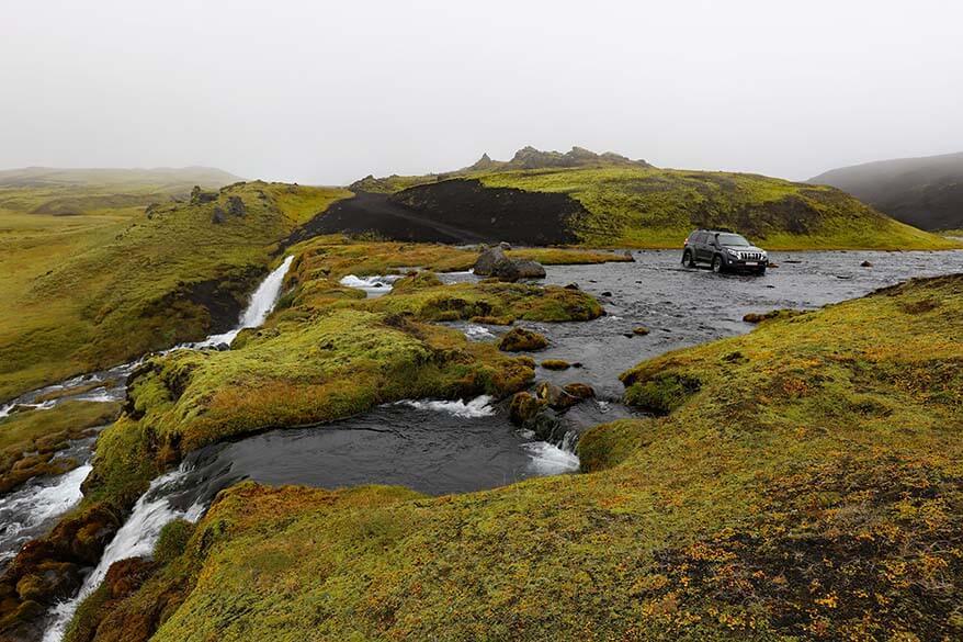 Jeep crossing a river in Icelandic highlands