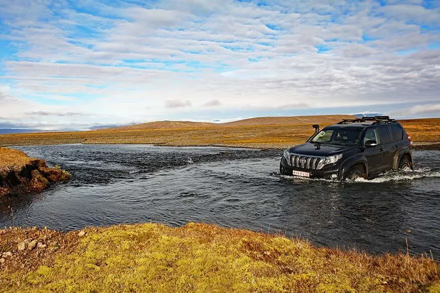 Super jeep crossing a river in the Icelandic Highlands