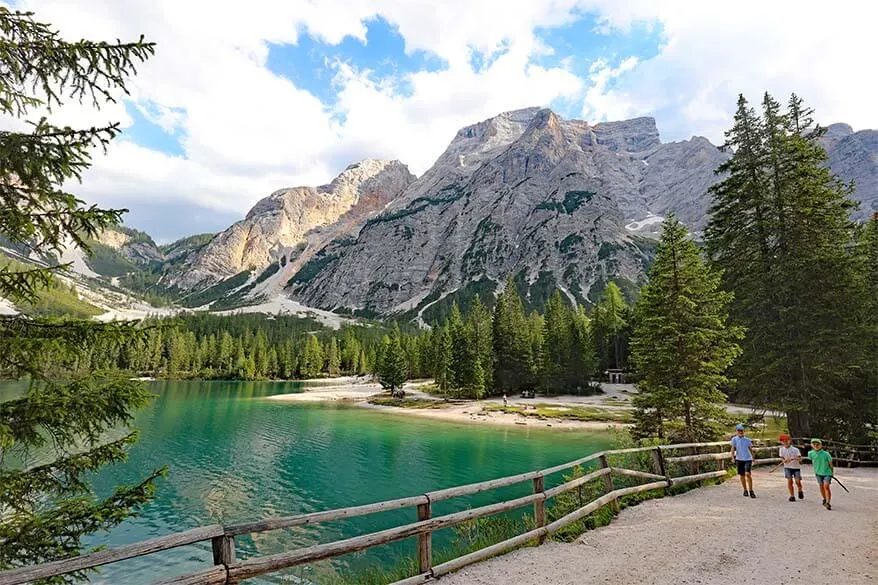 Hiking at Lago di Braies, the most beautiful lake of the Dolomites in Italy
