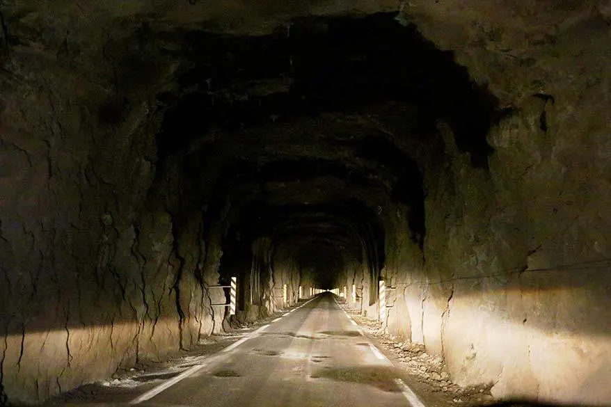 Driving in the Faroe Islands - narrow dark tunnel on Kalsoy island