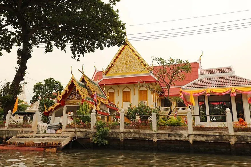 Colorful temple along Khlong Bangkok Yai as seen from the boat on the canal tour