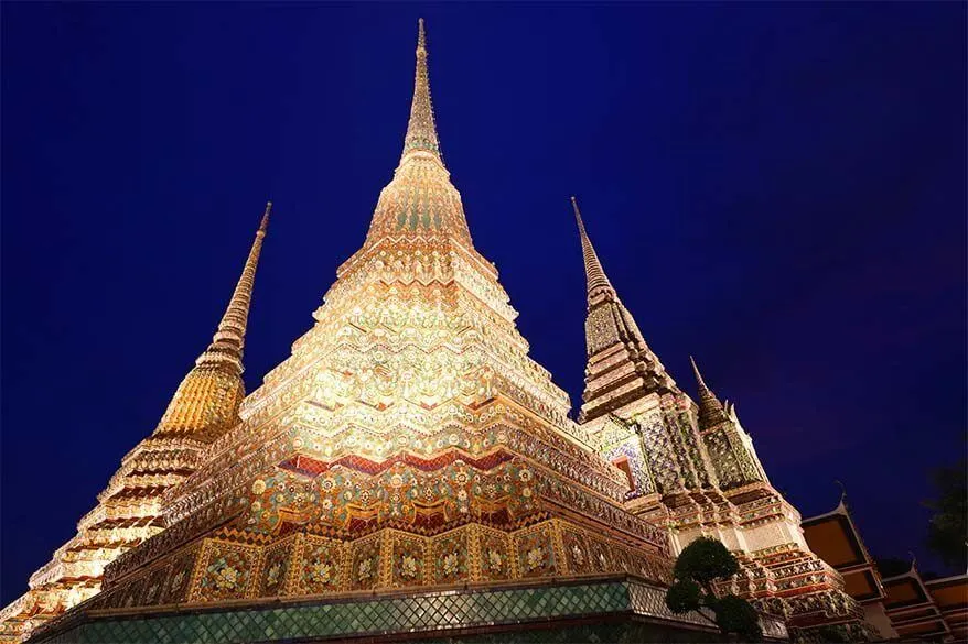 Wat Pho temple in Bangkok lit in the evening