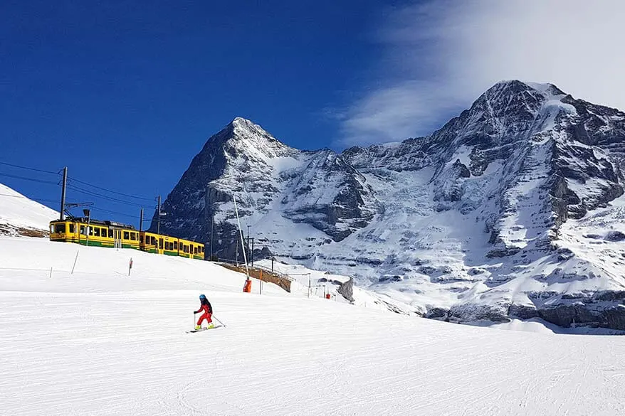 Skiing near Kleine Scheidegg in Jungfrau in winter - Switzerland