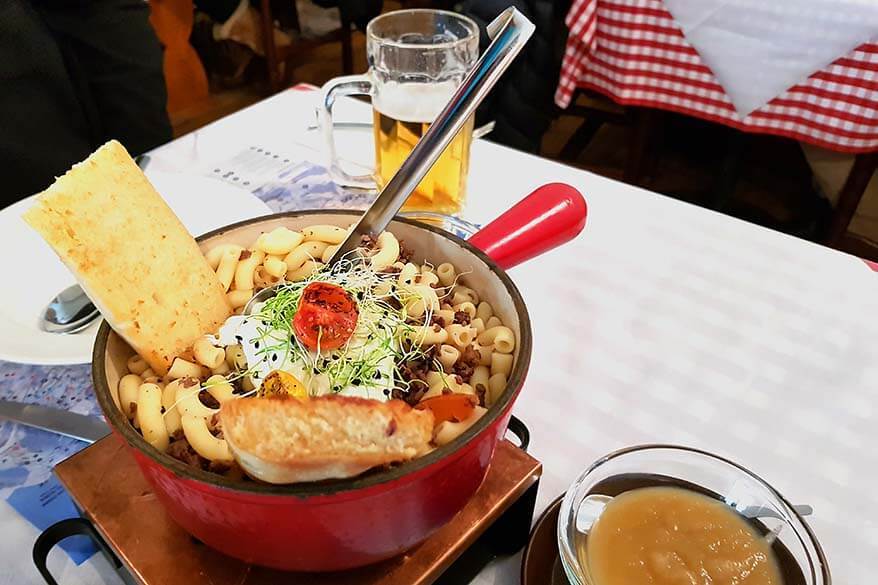 Traditional Swiss dish Ghackets mit Hörnli at a local restaurant in Wengen, Jungfrau Region, Switzerland