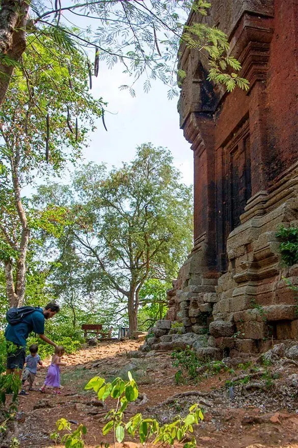 Kids exploring temple ruins in Cambodia