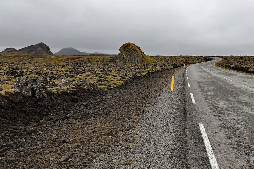 Road through lava fields on Reykjanes Peninsula in Iceland