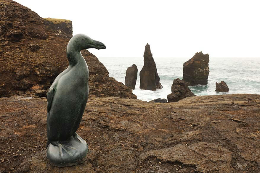 The Last Great Auk statue and Valahnukamol Cliffs on Reykjanes Peninsula Iceland