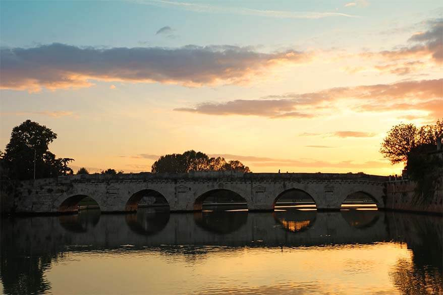 Tiberius Bridge in Rimini at sunset