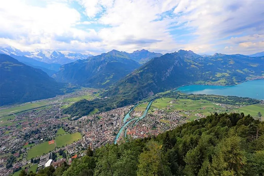 Interlaken town, Lake Thun, and the mountains of Jungfrau Region as seen from Harder Kulm in Interlaken