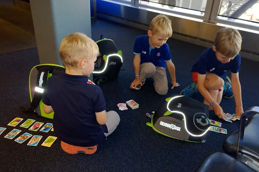 Kids playing at the airport - tips for flying with children