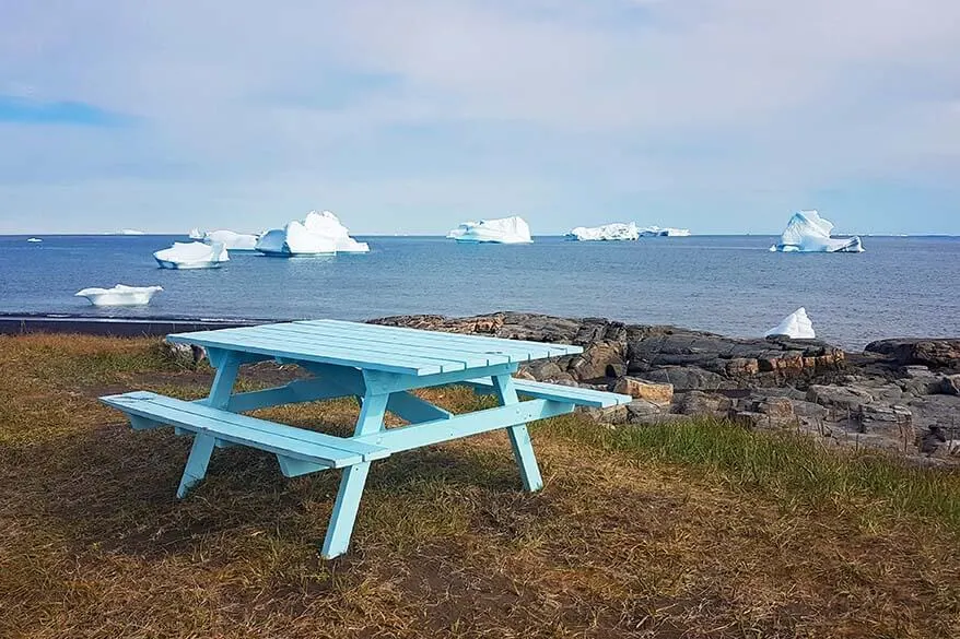 Picnic table with icebergs in the background - Disko Island Greenland