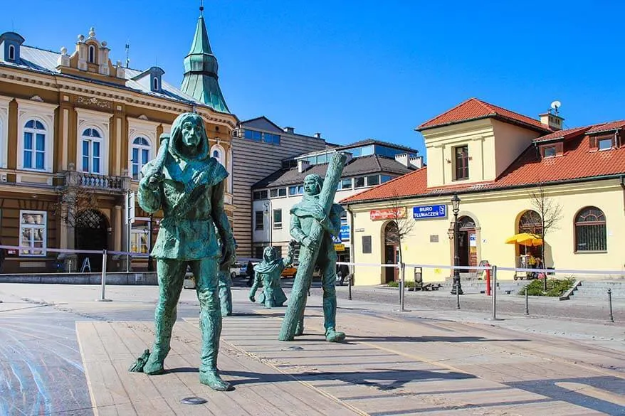 Miners sculptures on the market square in Wieliczka town in Poland