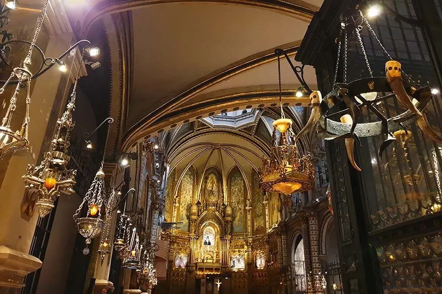 Offer lamps inside the church of Montserrat Abbey