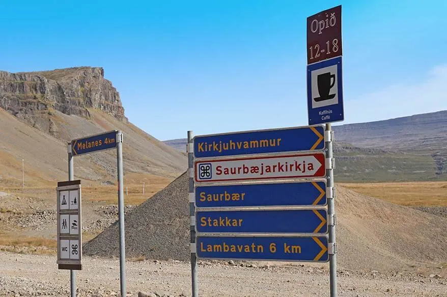 Road signs at the Raudasandur Beach in Iceland