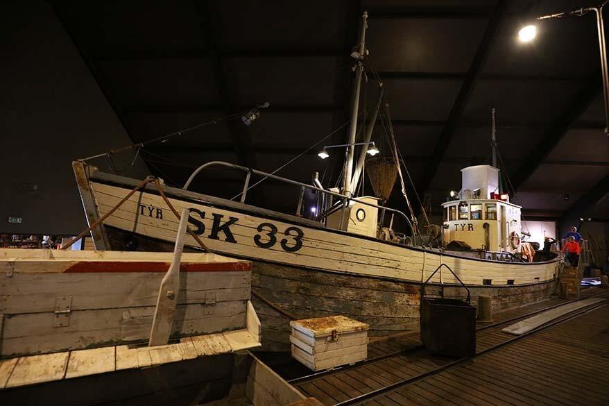 Old fishing boat inside the Herring Era Museum in Siglufjordur