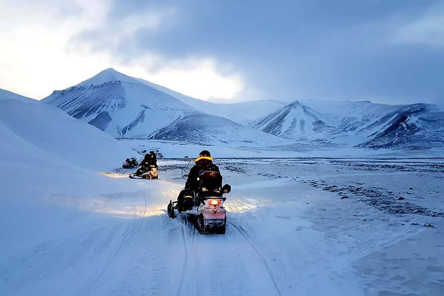 Snowmobiling in Svalbard in winter