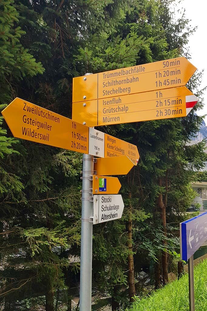 Hiking trail signs at Lauterbrunnen Train Station