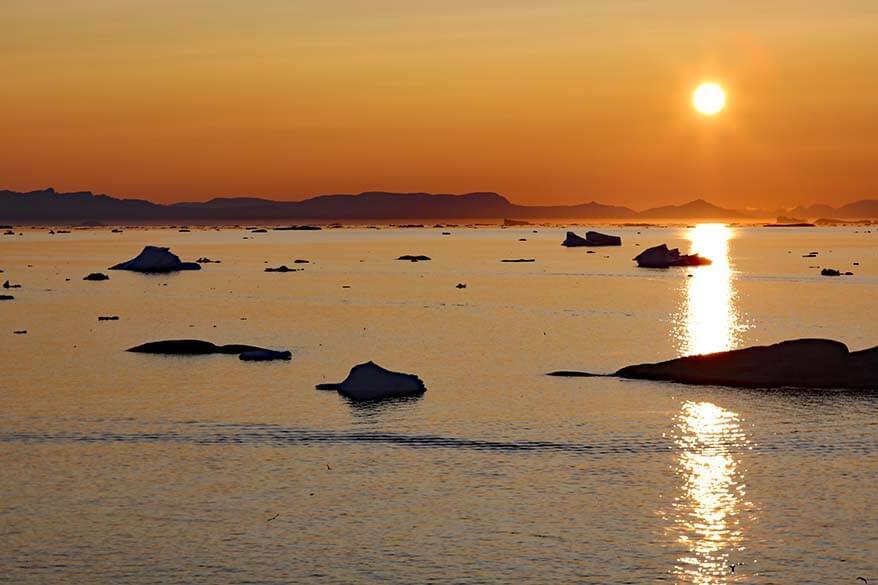 Icebergs and midnight sun in Ilulissat