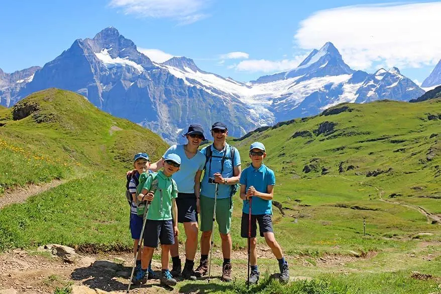 Jurga Rubinovaite, the founder of Full Suitcase travel blog, with her family in the Swiss mountains.