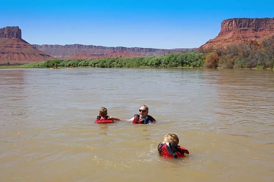Swimming in Colorado River during Moab rafting trip