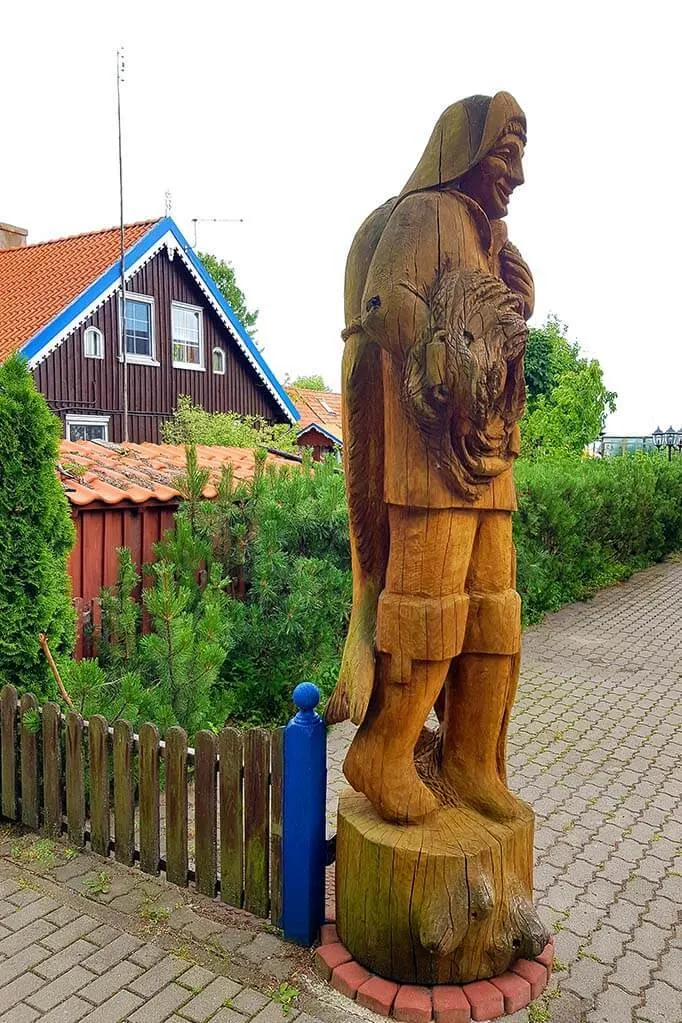 Wooden sculpture of a fisherman in Preila, Lithuania