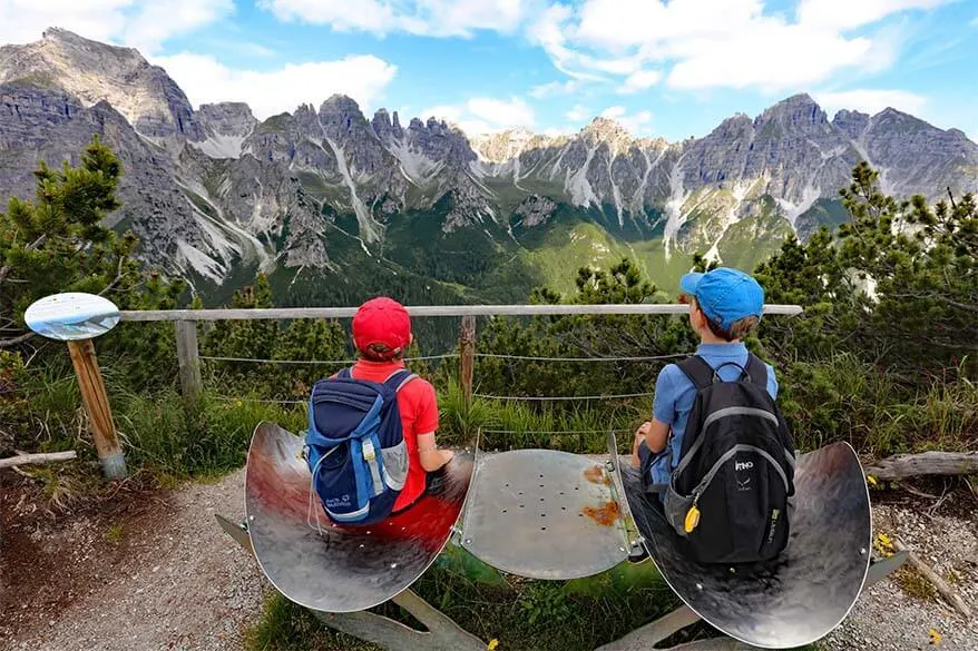 Chairs along the hike to Stubaiblick with a view of seven summits of Stubai