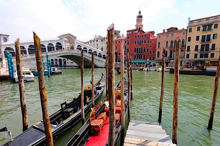 Traditional Venetian gondolas at Rialto Bridge