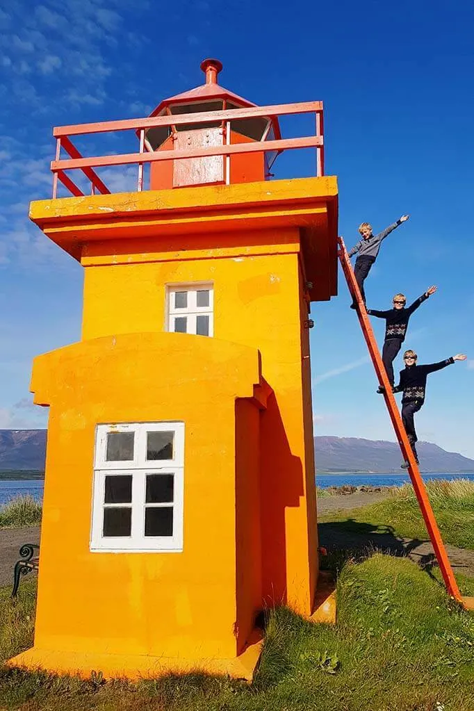 Fun travel picture of a colorful lighthouse in Iceland