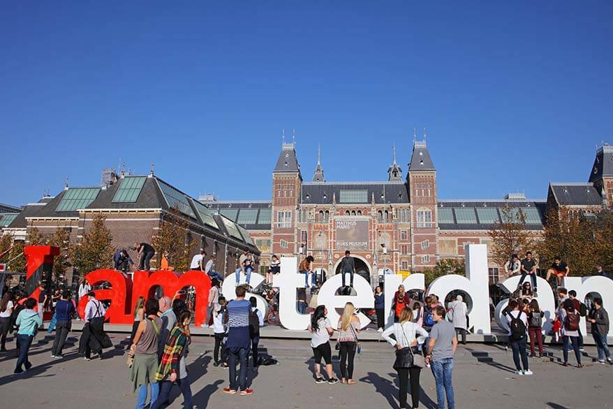 I Amsterdam sign at Museumplein in Amsterdam with lots of tourists taking pictures