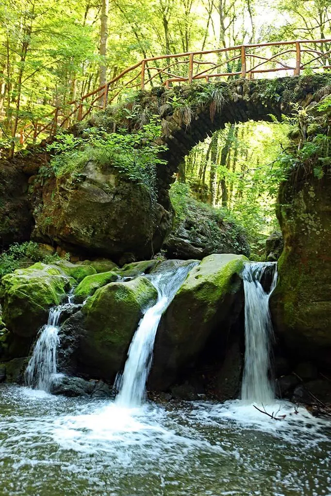 Schiessentumpel waterfall at Mullerthal Trail in Luxembourg